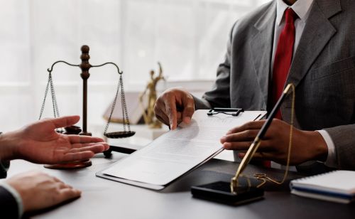 The boss is pointing in the face at the helper who misbehaved in business or legal matters in law firm office. Legal law, advice deal justice and law concept.